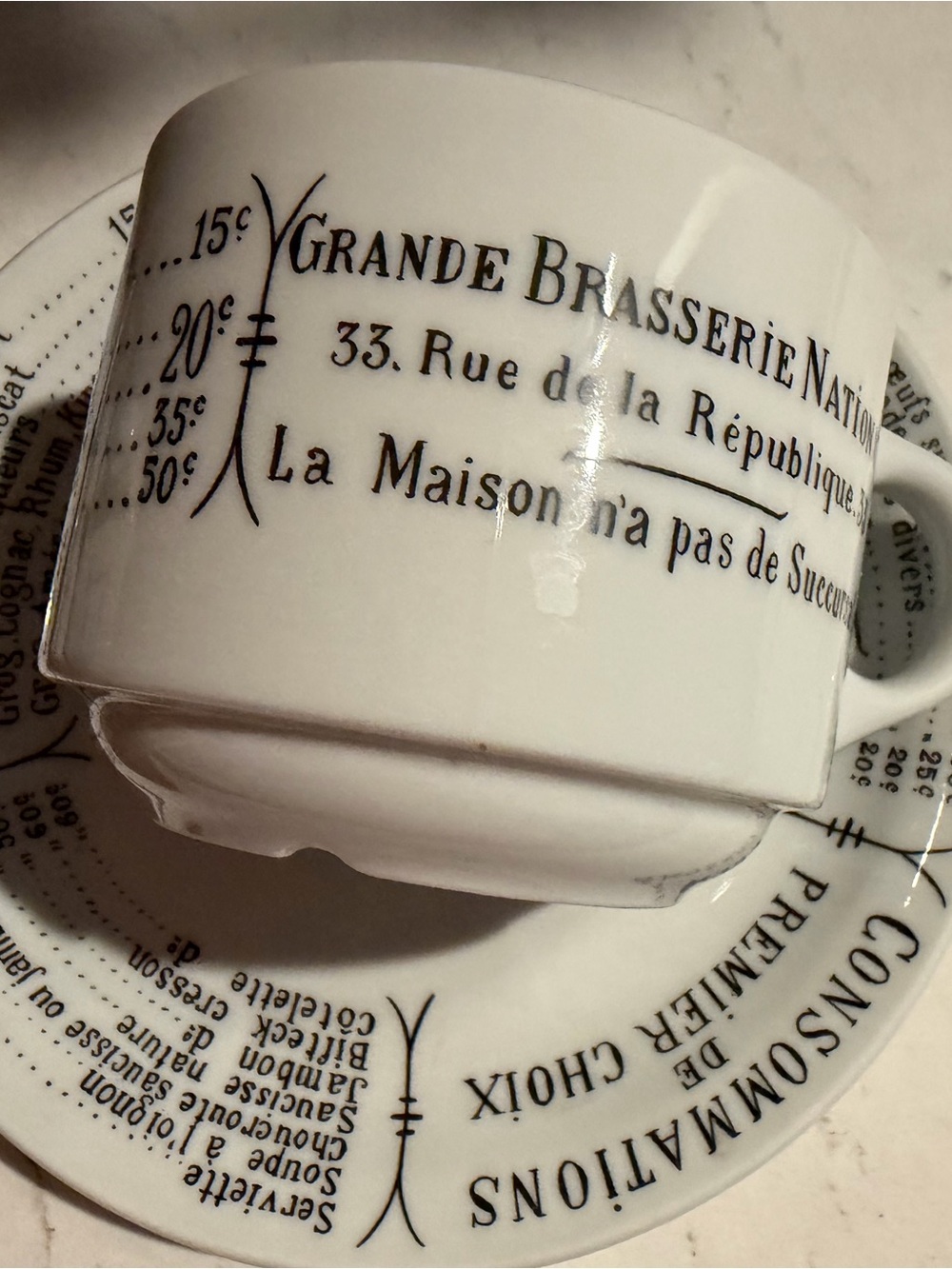 White Porcelain Espresso Cup and Saucer Set with Script Design